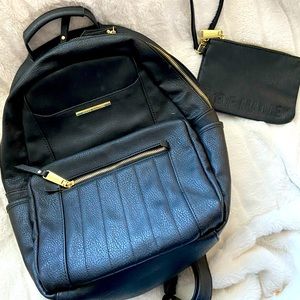 This Steve Madden backpack comes with a Steve Madden clutch, perfect for travel